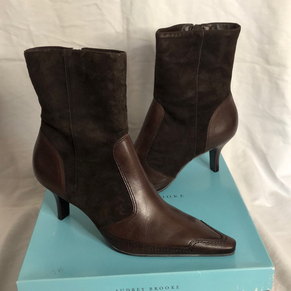Audrey Brooke pointed toe, heeled boots.